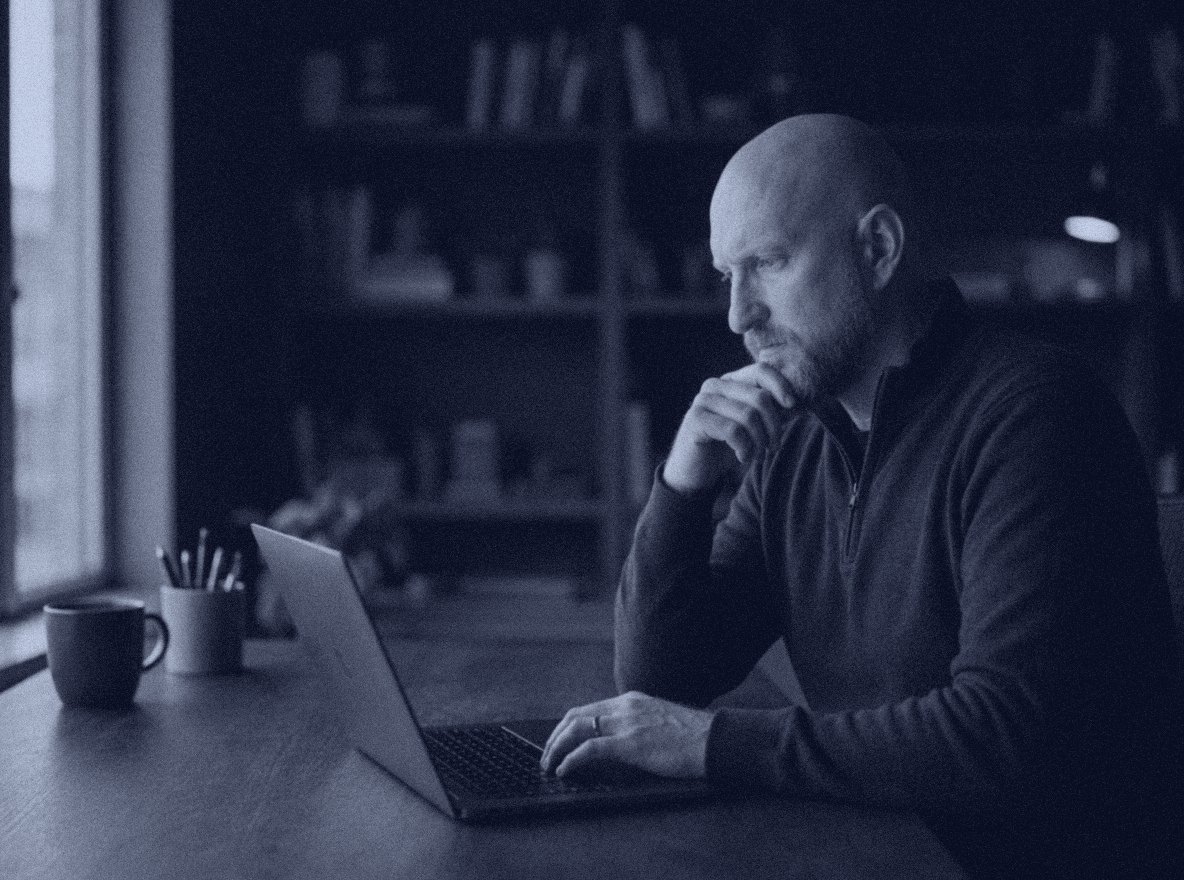 Brett Coakley, executive coach and fractional operations leader, at work in his office